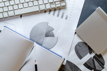 Notebook background. Charts graphs diagram in office. Finance control and analysis concept. Concept image of data gathering and statistical working.