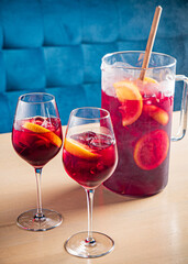 cold sangria with fresh fruits and berries