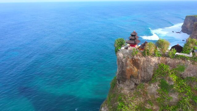 Bali - Aerial 4k footage of Pura Luhur temple in Uluwatu. Cliffs and ocean from above.	