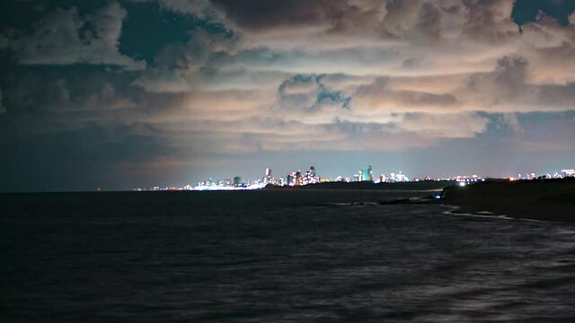 Timelapse video - view of the night city on the Mediterranean coast



