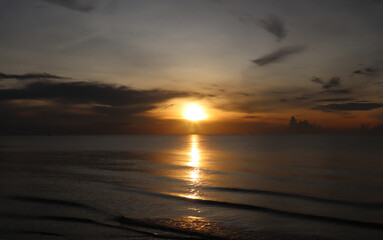 soft lens sunrise on the beach