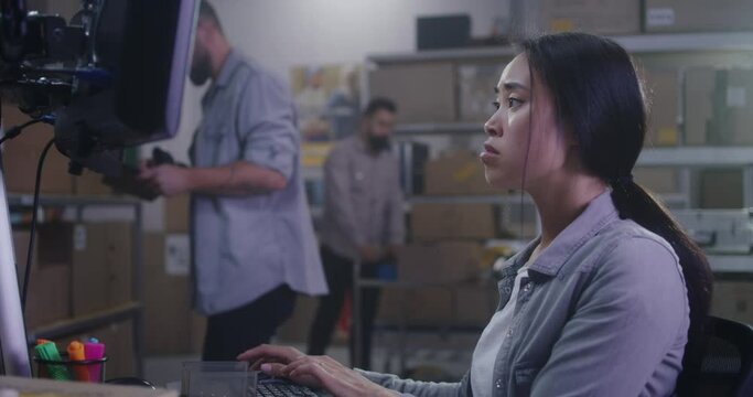 Workers checking information on computer