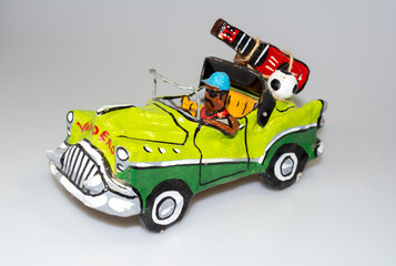 Paper car model - veteran. Souvenir from a holiday in Havna
