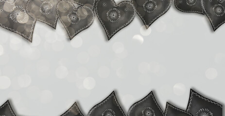 black design hearts frame on flat background with copy space.
