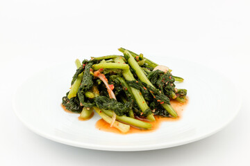 Radish kimchi on white background