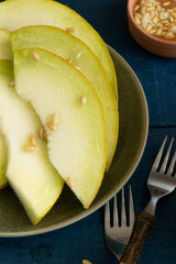 Refreshing summer food - sliced raw melon, ready to eat