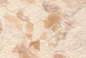 Hand crafted rough paper background with natural fibers and dried leave. Extra large highly detailed image. Recycled paper concept.