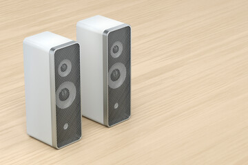Fototapeta premium Stereo computer speakers on wooden desk