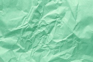 Eco friendly Neo mint or Aqua menthe color on recycled organic empty crumpled paper for the...
