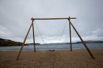 Wooden Swing at Arctic Ocean, Terabika, Murmansk, Russia