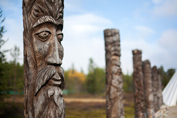Alley of majestic idols at Sami Village, Murmansk, Russia, the four idola of elements (fire, earth,...