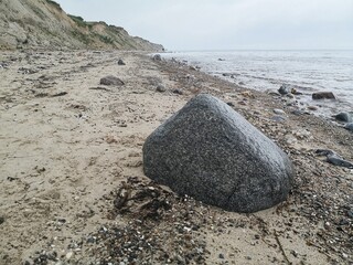 Boulder at steep coast