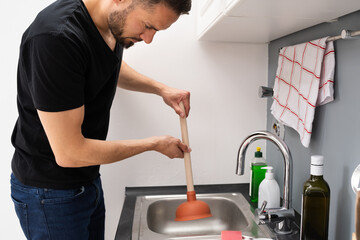 Cleaning Blocked Drain Clog In Kitchen Sink