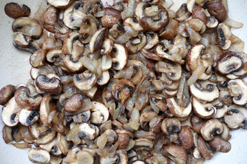 Fried champignon with onions