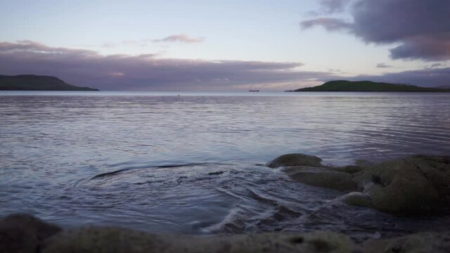 Cool blue sunset on waters in Scottish Highlands