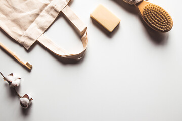 Natural brushes made of wood and soap on the background of concrete, bamboo toothbrushes PNOV2019