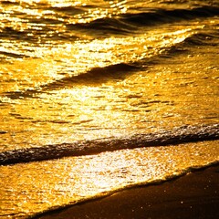 Sea water on golden warm light