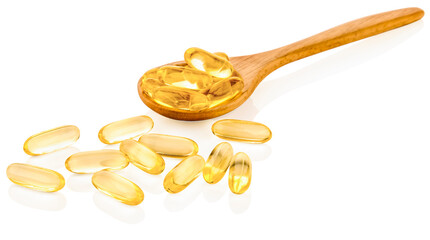 Fish oil capsules in a spoon