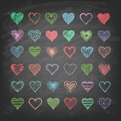 Set of hearts on the blackboard. Hand drawn. Vector illustration. 
