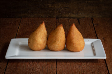 Coxinha. Traditional brazilian deep fried chicken snack. Brazilian food.