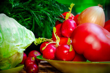 vegetables ripe red tomato sweet pepper dill onion radish orange carrot cucumber white cabbage closeup