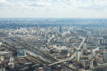 Naklejka na ściany i meble Russia, Moscow, 2019: view from the Ostankino TV tower on a panorama of the city with railway tracks and wagons