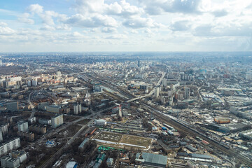 Fototapeta na wymiar Russia, Moscow, 2019: view from the Ostankino TV tower on a panorama of the city with railway tracks and wagons