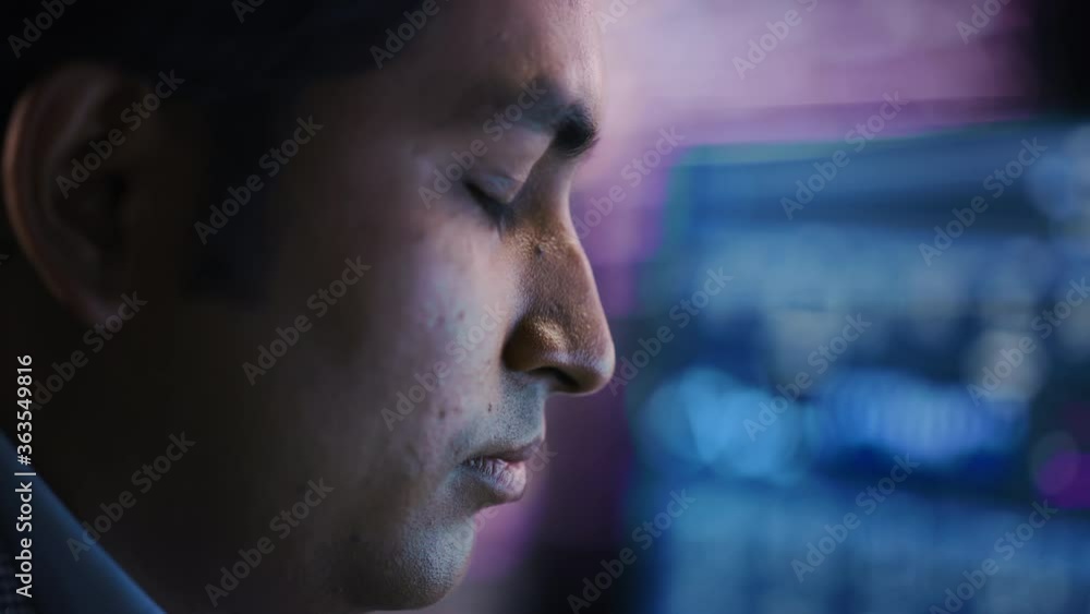 Aufkleber confident handsome man looks at monitor screen focused. professional businessman thinking hard while