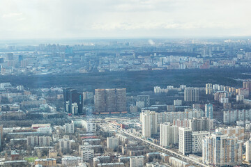 Russia, Moscow, 2019: view from the Ostankino TV tower to the city panorama, towards the Timiryazevskaya metro station, daylight