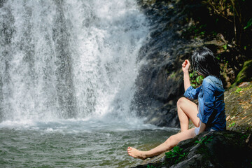 woman in the waterfall