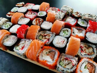 lots of different sushi close-up on the board