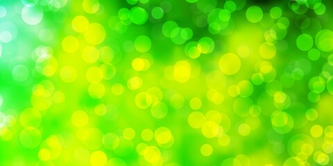 Light Green, Yellow vector backdrop with dots.