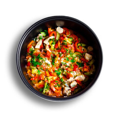 mouth-watering tasty vegetables red bell pepper carrots cucumber dill greens tomato onion shredded fried chicken meat in a pan together on a white background top view