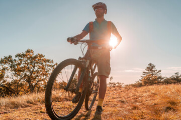 Man riding his mountain bike outdoor in nature