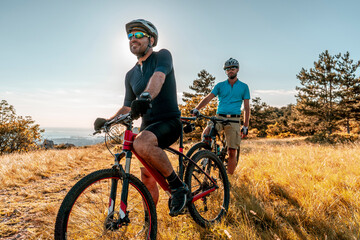 Fototapeta premium Man riding his mountain bike outdoor in nature