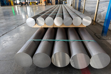 Fototapeta Aluminium (aluminum) production process and extrusion billets of aluminium in the factory. The conversion of alumina to aluminium metal is achieved by the Hall–Heroult process. obraz