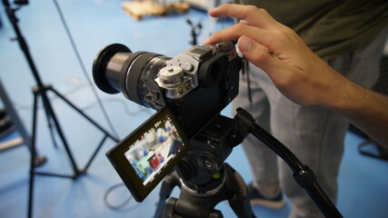 Videographer shooting the production process at the factory