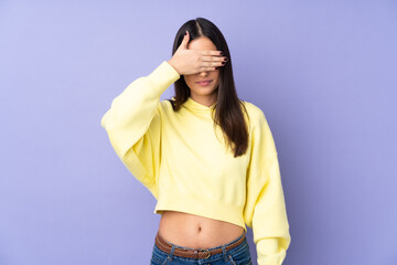 Young caucasian woman over isolated background covering eyes by hands. Do not want to see something