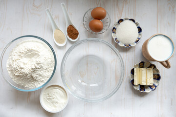 ingredients for homemade cinnamon rolls, baking pastry at home. flour, sugar, eggs