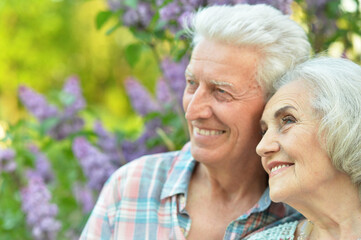 Close up portrait of beautiful senior couple hugging