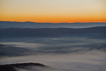 Sunrise and morning haze on mountain