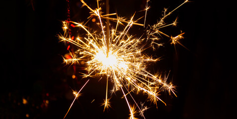 Bengali fire. Festive firework salute burst. Festive new year background.