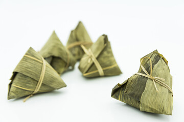 Closeup view of the zongzi (sticky rice dumplings), it is a traditional Chinese rice dish made of...