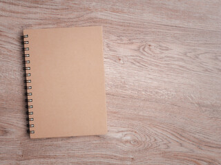 Fototapeta premium notebook on wood background