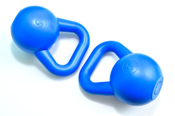 Couple blue kettle bell on isolate background
