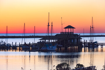 gorgeous colorful sunset on the gulf of mexico in biloxi, mississippi
