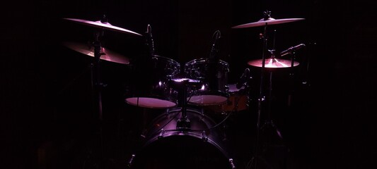 Drum set on a black background with a soft light