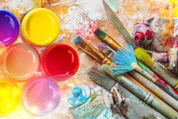 Artist brushes with creative art painting