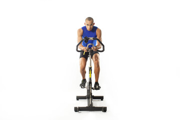 man on bicycle simulator doing exercises isolated on white background