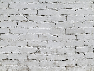 Abstract background old white brick wall with cracks and scratches. Landscape style. Great...